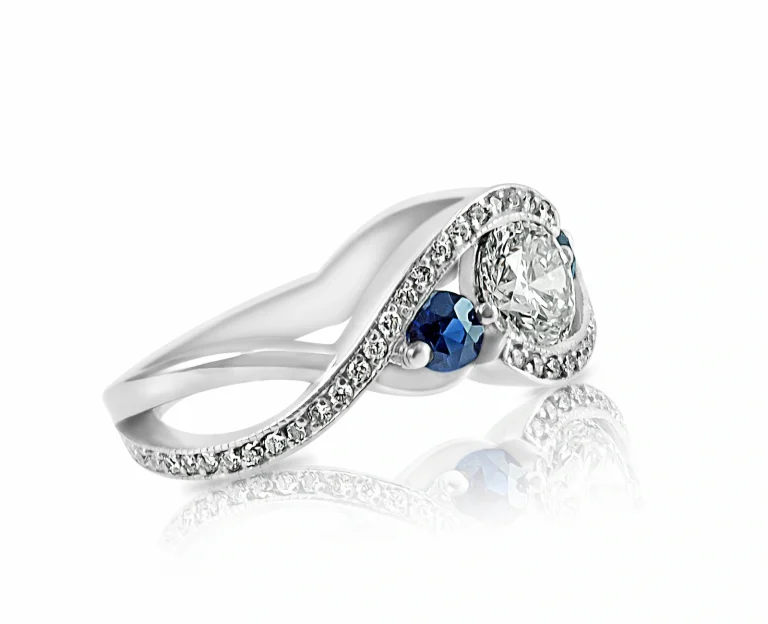 Diamond and sapphire platinum engagement ring