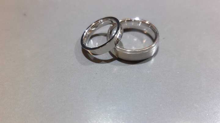 Two handmade white gold band rings