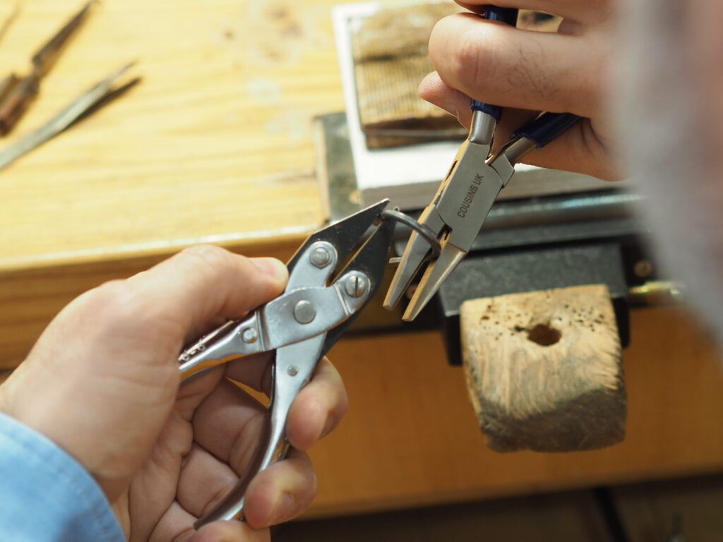 Hand turning gold for a custom ring
